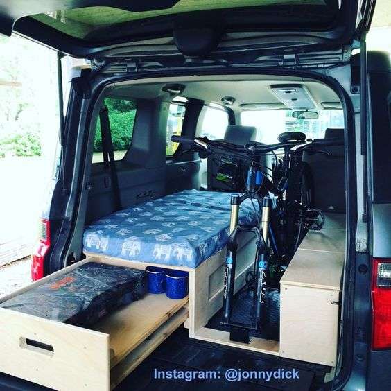 Silver honda element single bed mountian bike weekend camper