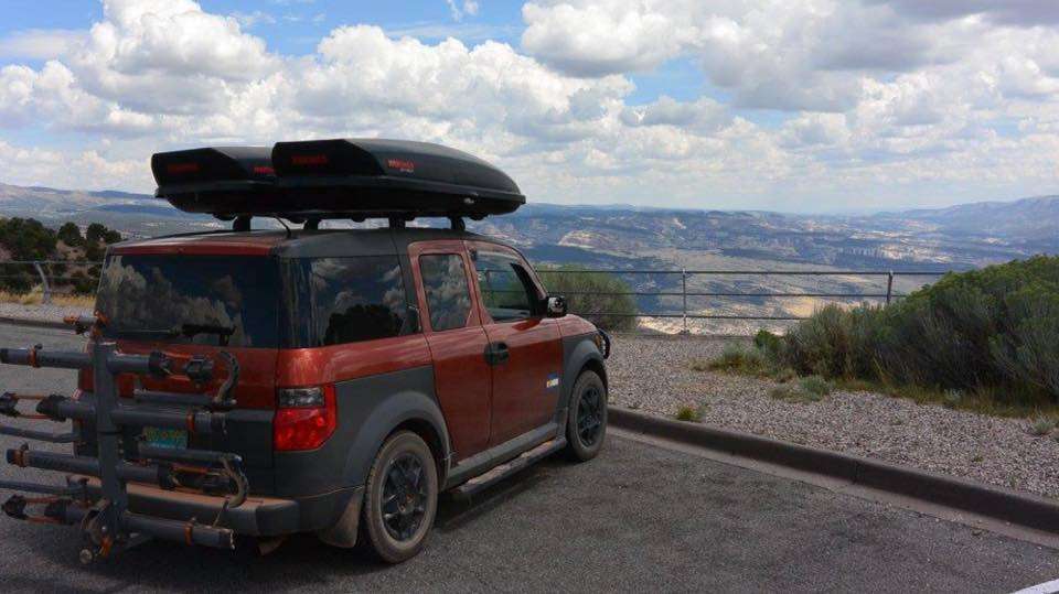 Red Honda Element Scenic Lookout Black Wheels Nerf Bars Roof Rack Yakima Roof Basket Travel Luggage Box Travel Hitch Mount Bike Rack